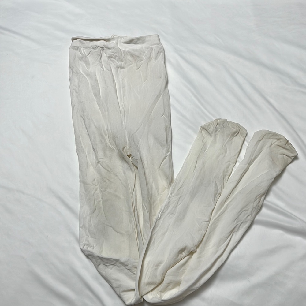 White tights pantyhose. Worn but still good.